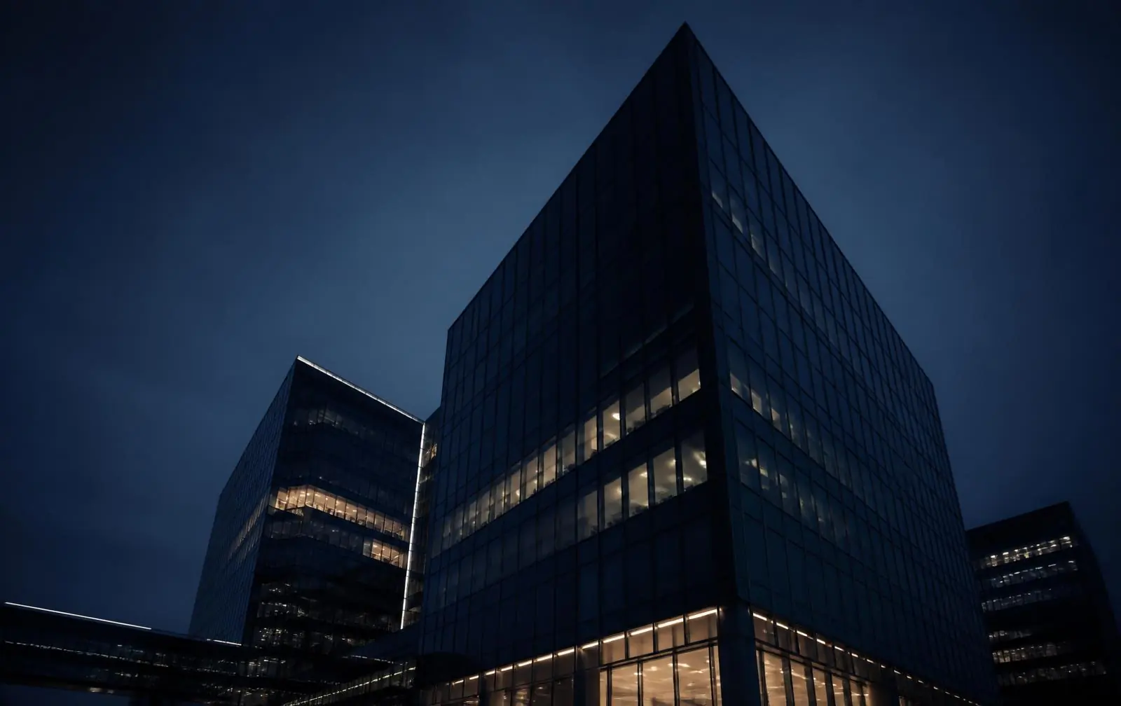 Modern commercial towers at blue hour